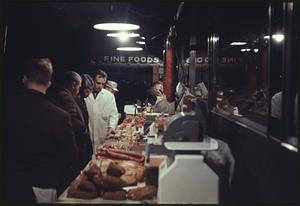 People in line at meat counter