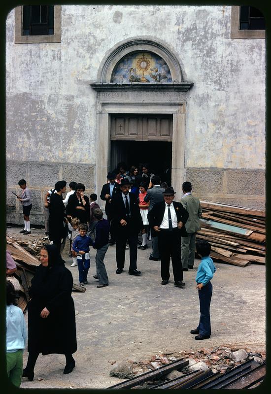 People exiting Church of San Leonardo di Limoges, Roccasicura, Italy