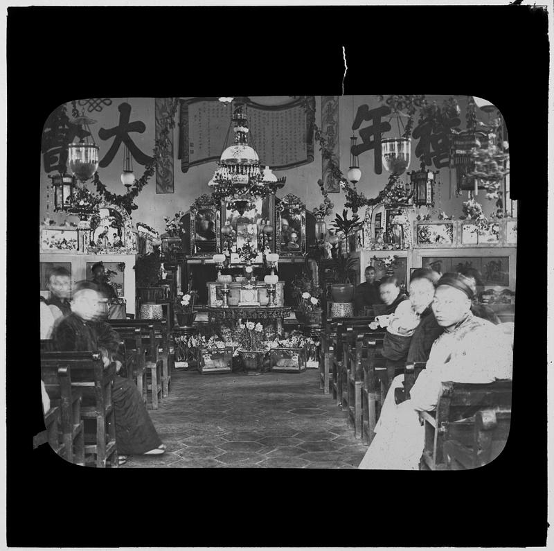 People sitting in a temple