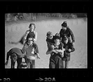 Boys ride piggyback, Carson Beach, South Boston