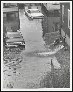 Flooded street, cars in water