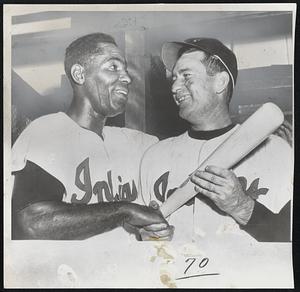 The Tomahawk and the arrow that knocked the Yankees out of first place and put the Indians at the top were wielder by Al Smith, left, and Bob Lemon. Smith hit the 9th-inning homer run for the 3-2 victory yesterday. Lemon fired a six-hitter.
