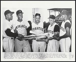 All Stars -- Danny Murtaugh, manager of the world champion Pittsburgh Pirates (center, looks over some mighty potent bats in the hands of four National League stars named for the All-Star baseball games July 11 at San Francisco and Smoky Burgess and Roberto Clemente of Pittsburgh.