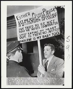 Pleads to See Child--Policemen talks to Phillip Chain, 38, who is picketing his former wife with sign pleading that he be permitted to see the couple's child, Darlene, 3. He told police their divorce decree gave him visiting rights, but that the former wife, Esther, 30, refused to let him see Darlene, saying the girl is sick. Police said the picketing broke no law.