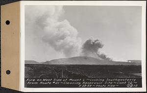Contract No. 72, Clearing a Portion of the Site of Quabbin Reservoir on the Upper Middle and East Branches of the Swift River, Quabbin Reservoir, New Salem, Petersham and Hardwick, fire on west side of Mount L, looking southwesterly from Route 21, Greenwich, Mass., May 23, 1939