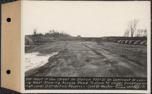 Contract No. 80, High Level Distribution Reservoir, Weston, 300 feet west of Oak Street on Sta. 900+00 on Contract 81, looking west showing access road to dam 5 under construction, high level distribution reservoir, Weston, Mass., Dec. 5, 1939