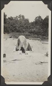 Pumps on their foundations protected with canvas