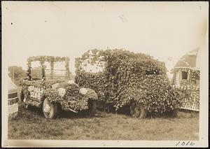 Vehicles decorated for parade at Riverside Park