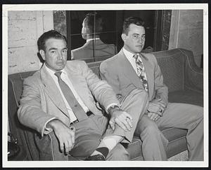 Aiming for Second Place This Year are Nippy Jones, left, Phillies third baseman, and Del Ennis, Phils outfielder, both of whom played on Philadelphia's championship club last season. The picture shows them relaxing at the Hotel Kenmore as they wait for evening and a night game with the Braves.