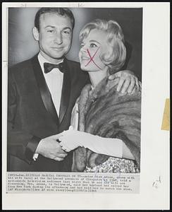 Tells Marital Troubles on TV--Actor Nick Adams, shown with his wife Carol at the Hollywood premiere of Cleopatra in 1963, told a nationwide television audience last night that he and his wife are divorcing. Mrs. Adams, in Hollywood, said her husband had called her from New York during the afternoon and had told her to watch the show.