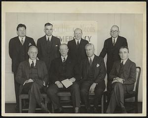 Mayor Mansfield, in his first appearance since his inauguration, at a luncheon, presides as chairman of the Boston Central Labor Union Emergency Campaign Committee at the Chamber of Commerce today. (Monday) Left to right: (Front row) J.W. Farley, general chairman of the Emergency Campaign of 1934; Mayor Mansfield, chairman of the Boston Central Labor Union Emergency Campaign Committee; Edward A.Taft, chairman of the Industry and Finance division; Francis A. Barrett, executive manager of the Emergency Campaign; (Back row) Harry N. Burroughs, exec chairman; William F. Dwyer, secretary-business agent of the Central Labor Union; Charles B. Campfield, president of the Central Labor Union; and James T. Moriarty, president of the Mass. branch, American Federation of Labor.