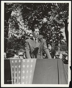 Mayor in Fighting Speech: Mayor Maurice Tobin, speaking at exercises dedicating "Treasury House" on boston Common urged support for the Treasury Defense Savings campaign. "We must maintain and equip an Army of two million men," he said, "and be ready, if necessary to double it!"