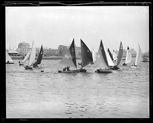 Frostbite yachts on the Charles River, Maclaurin Building's dome in background