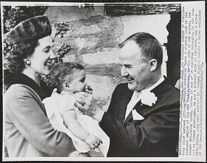 Bride and groom and youngest member of family
