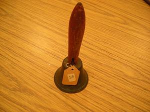 Metal bell with wooden handle