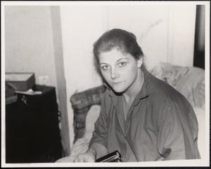 Woman looking at photographer