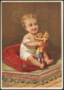 Child playing with a doll.
