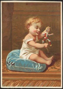 Child playing with a doll.