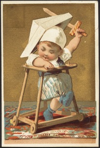 Boy in a walker with paper hat swinging wooden sword.