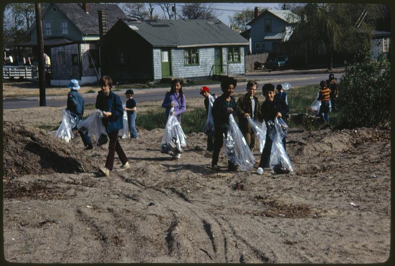 Children in Onset, Mass. cleanup debris along road etc.