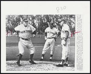 Casey Stengel in Spring Training - The manager of the New York Mets, Casey Stengel, is on the mound as he demonstrates how to whip around to second base for the pick off. Jay Hook, center, and coach Ernie White look on. The Mets started their spring training today.
