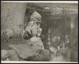 "Hiawatha", Played by Iroquois Indians From Lake Erie Reservation, on the Delafield Estate at Riverdale, Under the Organization of the Woman's Municipal League of New York. YS. Indian boy sailing boat.