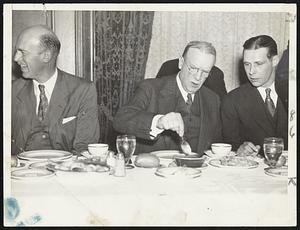 Two young men of Boston, former Senator Henry Parkman, Jr. (at left) and Mayor-Elect Maurice J. (at right) are pictured flanking Mayor Mansfield, who is taking his Advertising Club luncheon. E880Former Senator Parkman looms importantly in the Hub political picture for his gift of G. O. P. to Tobin