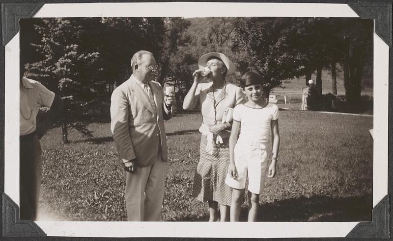 An unidentified man, woman and child