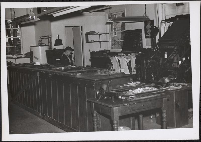 View of the interior of the Sharon Advocate with Richard Reeve shown in his Boy Scout uniform