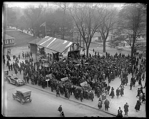 A crowd of people around a building selling liberty bonds