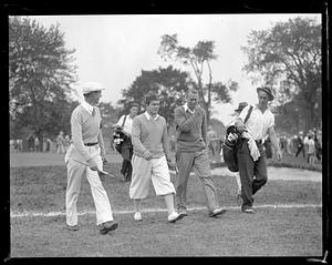 Golfers walking