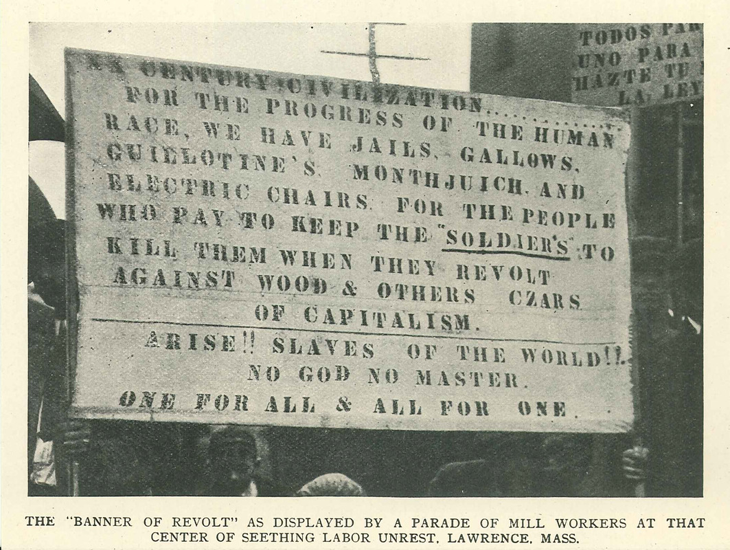 The "banner of revolt" as displayed by a parade of mill workers at that center of seething labor unrest, Lawrence, Mass.