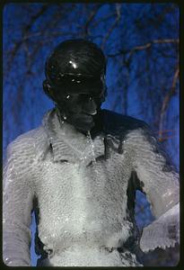 Ice-covered head and torso of statue representing Learning, Boston Common