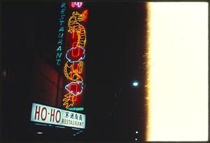 Ho-Ho Restaurant sign lit up at night