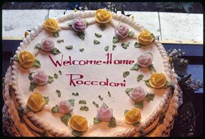 Cake decorated "Welcome Home Roccolani"