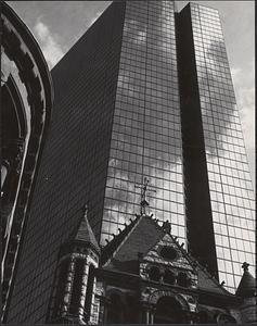 Detail of Trinity Church tower with Hancock Tower in view, Boston