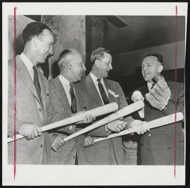 Baseball's Their Topic at the NCAA convention in New York with former Giants pitching great Hal Schumacher (right) holding court with collegiate coaches (left to right) George Case, Rutgers; Marty Karow, Ohio State; and John Simmons, Missouri. Simmons, as coach of the NCAA titlists, was to be honored as Coach of the Year today.