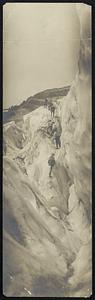 Prof. J. N. Le Conte and party crossing the rice fields of the Nisqually glacier where the crevasses were a hundred feet in depth. Prof Le Conte found that the Nisqually glacier was flowing at an average rate of 16 miles in 24 hours in the center and from 5 to 6 on each side.