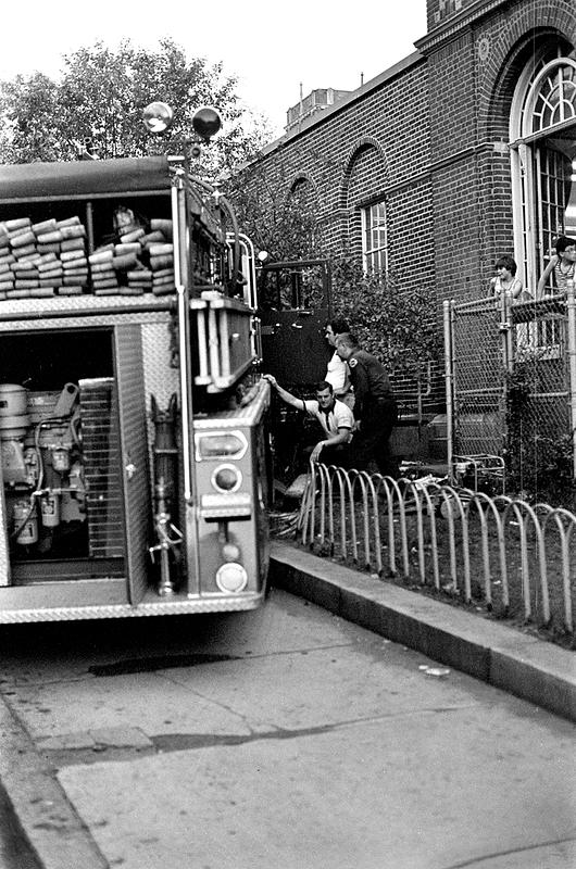 CFD 937 President Bill Abramofsky, off duty firefighter Jimmy Corn, and Dept. mechanic Charlie Garbarino inspect the damage