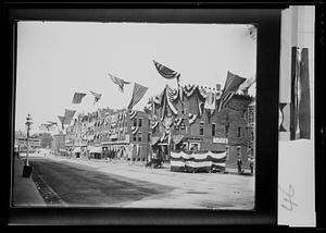 Merchants Week, east side of Main Street in red, white & blue bunting - looking northeasterly from corner of West Central St. and Main St.