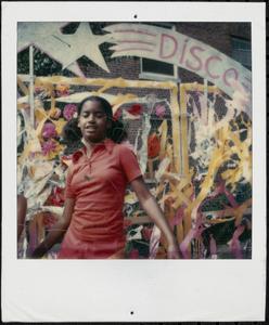 Young woman at a neighborhood disco block party, 1978