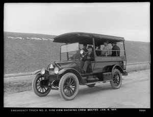 Distribution Department, Emergency Truck No. 2, side view showing crew seated; at Chestnut Hill Reservoir, Brighton, Mass., Jan. 8, 1917