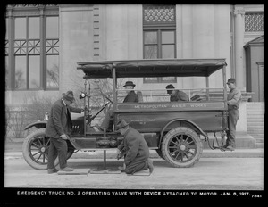 Distribution Department, Emergency Truck No. 2, operating valve with device attached to motor; at Chestnut Hill Reservoir, Brighton, Mass., Jan. 8, 1917