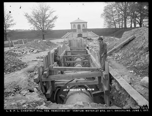 Distribution Department, Low Service Pipe Lines, Chestnut Hill Reservoir, removing 48-inch Venturi meter at station 44-1, Brookline, Mass., Jun. 1, 1917