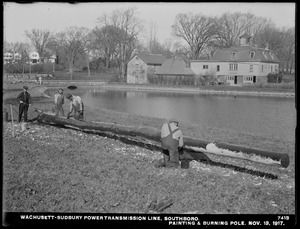 Wachusett Department, Wachusett-Sudbury power transmission line, painting and burning pole, Southborough, Mass., Nov. 13, 1917