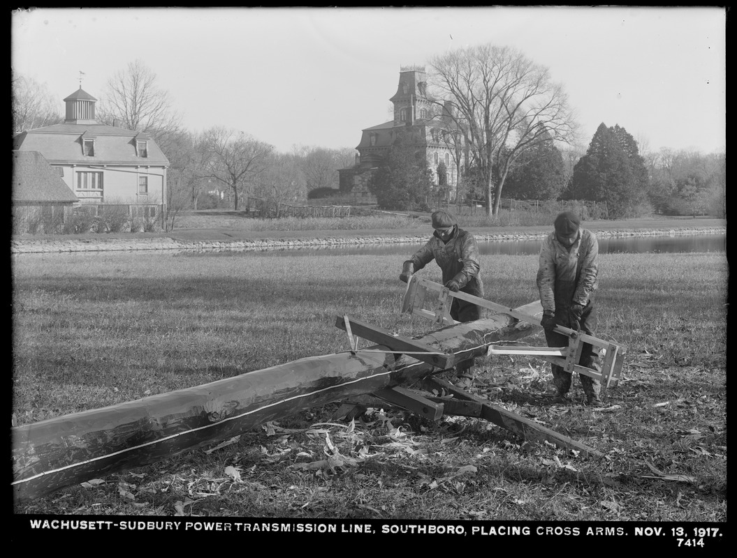 Wachusett Department, Wachusett-Sudbury power transmission line, placing cross arms, Southborough, Mass., Nov. 13, 1917