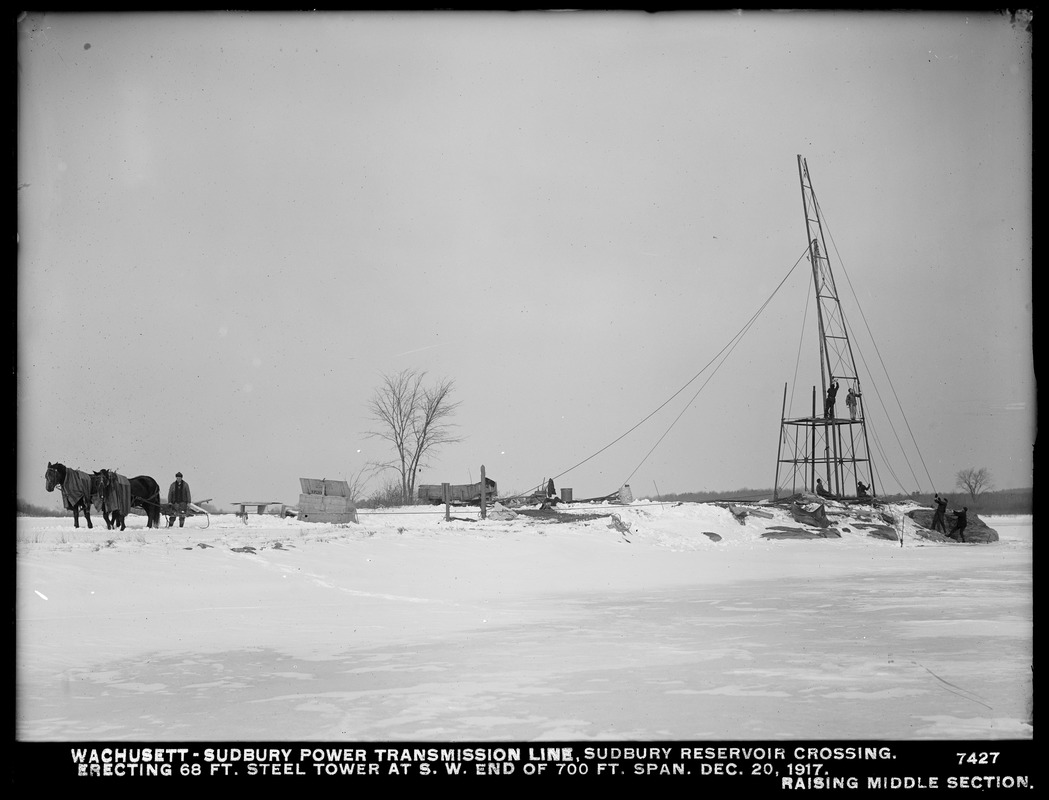 Wachusett Department, Wachusett-Sudbury power transmission line, Sudbury Reservoir crossing, erecting 68-foot steel tower at southwesterly end of 700-foot span, raising middle section, Southborough, Mass., Dec. 20, 1917