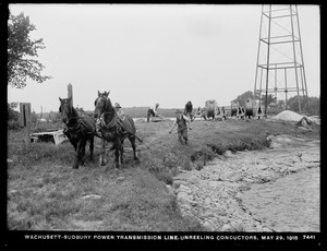 Wachusett Department, Wachusett-Sudbury power transmission line, unreeling conductors, Southborough, Mass., May 29, 1918