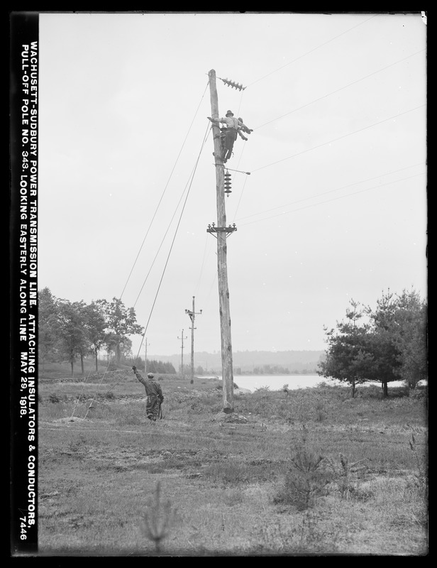 Wachusett Department, Wachusett-Sudbury power transmission line, attaching insulators and conductors, pull-off pole No. 343, looking easterly along line, Southborough, Mass., May 29, 1918