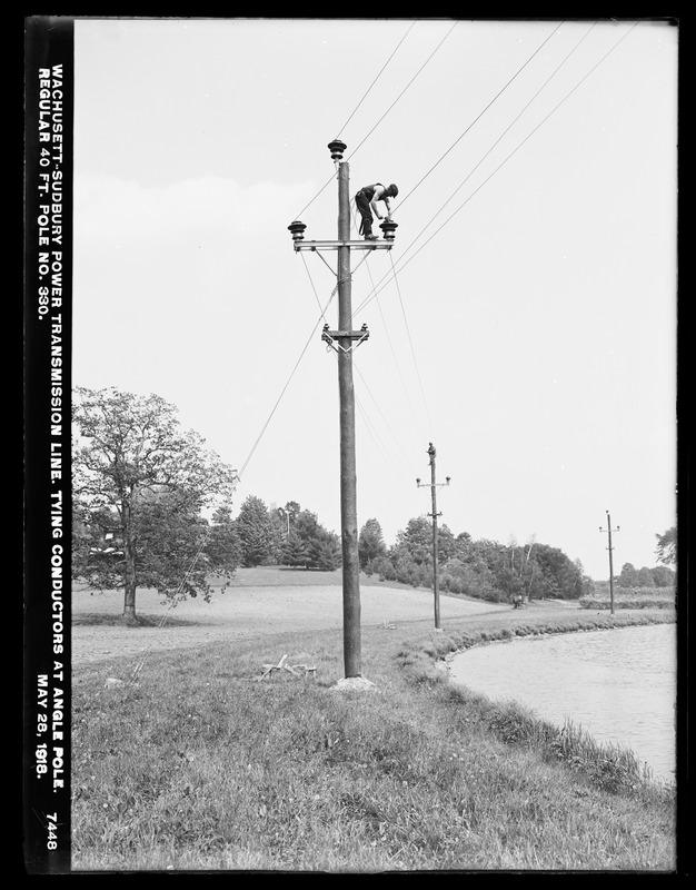 Wachusett Department, Wachusett-Sudbury power transmission line, tying conductors at angle pole, regular 40-foot pole No. 330, Southborough, Mass., May 28, 1918